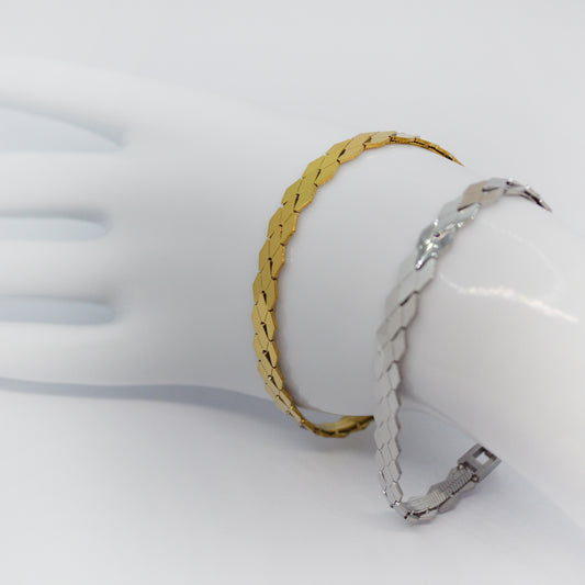 Srebrna in zlata zapestnica Linea – minimalistični dizajn